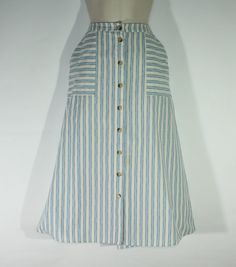 "Used Women's Blue & White Stripped Fabric COERCION London Button A-Line Mid Calf Length Casual Summer Party Tea Skirt     Size - UK 10 EU 38   Please check measurements     LYING FLAT ON THE FLOOR:   SKIRTS LENGTH - 30.5'' OR (77.4 CM )  WAIST - 14\" OR ( 35.5 CM ) ACROSS THE BACK  HIPS - 20.5 \" OR ( 52 CM )   The Skirt is used but in good condition,   please see all pic. .  ############### *Please note that most of my items are vintage and has therefore been previously used unless stated otherwise. Vintage items will have some degree of wear, bobbling or a musty smell. Please take this into consideration when purchasing. If the item has any defects these will be stated in the listing and I do my very best to describe items as honestly as I can.I'm unable to wash the items so they will n Light Blue Buttoned Bottoms For Spring, Striped Bottoms With Buttons For Summer, Striped Summer Bottoms With Buttons, Blue Buttoned Skirt For Spring, Beach Cotton Skirt With Buttons, Cotton Beach Skirt With Buttons, Blue Button-up Summer Skirt, Striped Skirt With Pockets For Summer, Tea Skirt