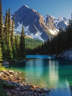 a lake surrounded by pine trees and mountains