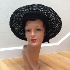 "Circa:   1950s 1960s How shocked a Moscow crowd must have been when Western models were allowed to have a photo shoot. This Schiaparelli is an interesting 'straw' Breton hat. Part is a vinyl ribbon of weave and the other is a wiring then a very light straw weave as the brim. Almost like a spider's web. Simply a rare look from that time. Oh there are straw bretons but not like this one!  A compliment to any outfit. *please note that for larger hats, shipping costs have gone up to accommodate the Vintage Black Hat For Kentucky Derby, Vintage Black Hat For Spring, Vintage Black Cloche Hat With Wide Brim, Black Vintage Cloche Hat With Wide Brim, Retro Black Hat For Spring, Vintage Fedora Hat For Evening, Vintage Fedora For Evening Wear, Vintage Flat Brim Hats For Evening, Vintage Flat Brim Evening Hats