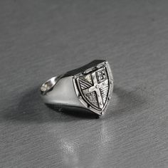 "SKU: k4550 \"Varangian Knight's Shield\" Features: Brand new sterling ring silver 925. Not plated, 100% solid silver metal! Approx weight of the product (Size 20mm)- 7.8 g.; Size of the top - 16x14 mm Processing: 1) Blackening by oxidation (More contrast black and white color) 2) Shine rhodium plated (Color looks like silver and it does not get dark in time) Availability of proprietary tag manufacturer - Yes; Manufacturing and country of origin - Ukraine; online shop - www.indigo.jewelry e-cata Symbolic Silver Sterling Signet Ring, Symbolic Sterling Silver Engraved Ring With Polished Finish, Classic Silver Signet Ring Collectible, Symbolic Sterling Silver Signet Ring With Polished Finish, Sterling Silver Symbolic Signet Ring With Polished Finish, Timeless Sterling Silver Hallmarked Signet Ring, Timeless Silver Sterling Engraved Ring, Silver Engraved Timeless Signet Ring, Timeless Silver Engraved Signet Ring