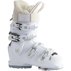 a pair of ski boots with white snow gear