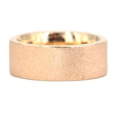 With such a minimalist design, the beauty is in the details. This delightfully classic band features slightly uneven edges, organic and timeless matte stone finish, hand-texturing, and a comfort-fit band. Wear as a wedding band, an anniversary ring, or as a right-hand fashion ring. Details: 18k Rose Gold 8 mm band width 2.5 mm thickness Ring Size 8.75 Alchemy's Bio & Catalog can be found here. Please contact us for resizing options, special order inquiries, or any other questions. Hand Fashion, Floral Engagement Ring, Emerald Cut Rings, Heart Necklace Diamond, Rose Gold Band, Gold Stone, Brown Diamond, Mens Band, Fashion Ring