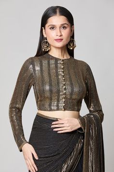 Black saree with contrasting metallic gold cutdana and sequin embroidery in striped pattern. Comes with coordinating embroidered blouse. - Aza Fashions Gold Georgette Blouse For Receptions, Formal Georgette Blouse With Sequins, Festive Gold Georgette Blouse, Gold Georgette Blouse With Cutdana, Evening Georgette Blouse With Unique Design, Evening Georgette Blouse With Self Design, Glamorous Festive Blouse With Cutdana, Festive Glamorous Blouse With Cutdana, Traditional Gold Blouse Piece For Evening