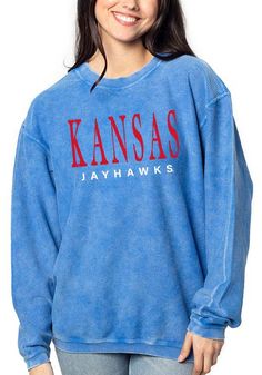 Make your way to the big game in this Kansas JayhawksWomens Blue Corded Crew Sweatshirt! This Jayhawks Long Sleeve Sweatshirt features a screen print team name on center chest. Stay warm and comfortable with this Womens KU Jayhawks Jayhawks Crew Sweatshirt. Pullover crew, Vintage washed, Extra soft heavy knit, Corded texture, 100% Cotton, 4 Blue Casual Tops For Game Day, Blue Team Sweatshirt For Fall, Blue Team Name Sweatshirt For Fall, Blue Relaxed Fit Tops For Game Day, Blue Casual Sweatshirt With Team Name, Casual Blue Sweatshirt With Team Name, Casual Blue Sweatshirt For Fans, Casual Blue Sweatshirt Fan Gear, Blue Tops For Fall Game Day