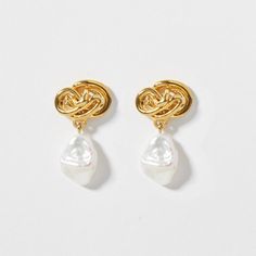 - organically shaped earrings punctuated with dropped freshwater pearls.  - .5 inch wide  - freshwater pearls in pearlescent white  - 14k gold-plate (nickel free)  - base metal 100% recycled brass Free Base, Pop Bottles, Mens Fashion Trends, Base Metal, Fresh Water, Freshwater Pearls, Gold Earrings, Pearl Earrings, Gold Plate