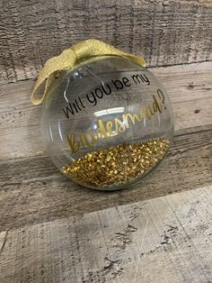 "Personalized Wedding Ornament. \"Will You Be My Bridesmaid, Maid of Honor, Flower Girl\" Gold/Rose Gold/Silver 3\" or 4' Glass ornaments are sold individually (Will You Be My Bridesmaid, Maid of Honor, Flower Girl, Matron of Honor, Jr Flower Girl, etc.), and can be personalized (back) with name, come complete with coordinating bow and are individually wrapped in a clear box with paper shred. Select from 3\" OR 4\" Glass Ornament AND Writing color Gold, Rose Gold or Silver All our items are made with the utmost care and love using high quality materials. Items are created and stored (when applicable) in a smoke and pet free environment and shipped, usually within 24 to 48 hours, from Trumbull, CT. We love to create all things that make YOUR EVERYDAY PERFECT. Head to www.etsy.com/shop/YourE Glass Wedding, Clear Box, Matron Of Honour, Wedding Ornament, Will You Be My Bridesmaid, Be My Bridesmaid, Glass Ornaments, Maid Of Honor, Gold Rose