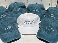 six hats with the words wife of the party written on them in white and blue