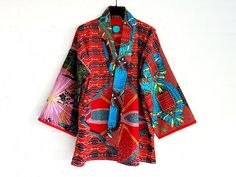 *Handmade New Vlisco Mix Cotton  Fabric Kimono Jacket* One size: Size shoulder to shoulder: 60 cm/ 23,6inch sleeve lenght: 38,5 cm/15,1inch sleeve wide: 22,5 cm/8,8  inch (measured laying flat) total lenght: 68 cm/26,7inch size wide open waist: 132cm/51,9 inch split lenght: 7cm/ 2,7 inch **Colours May Slightly Vary Due to Photographic Lighting Sources or Your Monitor. Red Kimono Sleeve Outerwear For Spring, Red Outerwear With Kimono Sleeves For Spring, Fitted Outerwear With Kimono Sleeves For Fall, Kimono Jacket, Womens Tunics, Photographic Lighting, The Netherlands, Womens Clothing Tops, Art Collection