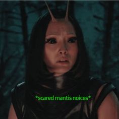 a woman with horns on her head and the words scared mantis notices in front of her