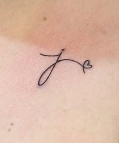 a woman's chest with the word love written in cursive writing