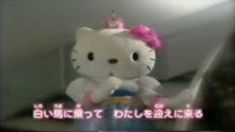 a hello kitty stuffed animal sitting on top of a table