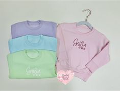 Your little ones can be super stylish and unique with a beautifully personalised cotton sleeved jumper.  Our beautifully thick jumpers are perfect as a birthday gift, a way to document the special day or for just wearing as a unique piece of clothing in the winter or colder months.  These pretty jumpers are wonderfully soft and perfect to pair with skirts, dresses and trousers and come in 4 different colour options.   This jumper features your little ones name alongside our signature three star Customizable Long Sleeve Pink Top, Playful Long Sleeve Customizable Tops, Casual Winter Sweatshirt With Name Print, Winter Birthday Sweatshirt With Letter Print, Winter Sweatshirt With Name Print In Relaxed Fit, Personalized Relaxed Fit Winter Sweatshirt, Winter Name Print Relaxed Fit Sweatshirt, Cotton Jumper, Three Star