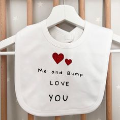 ⭐A lovely white cotton bib that reads Me and Bump Love You!⭐ ✨ Every order is handmade and perfectly packed! ✨ A unique bib for your baby and bump, a great idea for Christmas or their birthday. Why not add a matching top for your little one to wear and show off that they will become a big sister or brother to bump. Add a gift box to make the ultimate gift.  ⭐Variations And Add On's ⭐ Bib Reads: Me and Bump Love You Matching Tops are available: 6-12 Months (Top) 1-2 Years (Top) 2-3 Years (Top) 3- Promoted To Big Sister, Baby Boy Bibs, Personalized Baby Bibs, Custom Baby Gifts, Idea For Christmas, Dribble Bibs, Father's Day Gifts, The Ultimate Gift, Big Sister