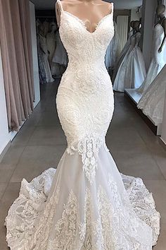 a wedding dress on display in a store