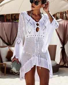 Fins West Beach Cover up, Beach Cabana Wear, Vacation Wear, White One Size  Going to a vacation beach resort or spending the day on the local beach, stay comfortable and cool in a sheer cover up. Made from soft polyester, this cover up is quick drying and soft on your skin. The sheer design complements swimwear on the beach and in the cabana. SIZING: This Cover up comes in one size. It may fit loose on a petite frame and is not a plus size item.  The size is best depicted in the product image.   Visit our store to explore Fins West entire collection. Whether you're sipping cocktails at a beachfront bar, lounging in the cabana, or dancing under the stars, our high-quality beachwear will keep you effortlessly chic. Fins West...Confident and Complete Knit Beach Dress, Womens Swimsuit, Crochet Cover, Crochet Swimwear, Beach Coverup Dress, Crochet Cover Up, Bathing Suit Covers, Costume Intero, Kimono Cardigan