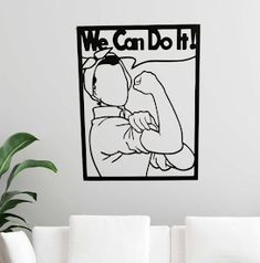 we can do it wall decal in a living room with white couches and potted plant