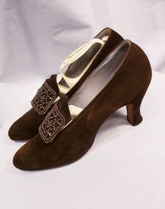 These solid 1900's ~ 1920's suede shoes are amazing! Attached to this pair of shoes is a steel cut buckle. Beautiful chocolate brown suede shoes are very wearable. Shoes are a size 7 1/2 aaa Measurements Length is 9 1/4 inches, width is 2 1/2 inches and heel is 2 1/2 inches. Incredible gently worn condition. Insole reads: Made for Sommer & Kaufman San Francisco Buyer to pay all related shipping charges. Questions Welcomed and Reasonable Offers considered Thank You Cityvintage Vintage Heels For Formal Fall Occasions, Vintage Formal Heels For Fall, Vintage Closed Toe Heels For Fall, Fall Vintage Closed Toe Heels, Vintage Almond Toe Heels For Fall, Vintage Brown Evening Heels, Vintage Evening Heels For Fall, Vintage Round Toe Heels For Vintage Events, Vintage Evening Heels With Leather Sole