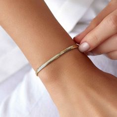 Our new 14k gold minimal chain bracelet. ★ Bracelet Features• Gold Kt: 14K Solid Gold (All pieces are stamped for authenticity)• Available Gold Colors: Yellow Gold• Chain Width: 3.4 mm Minimalist Yellow Gold Plated Bracelet, Minimalist Yellow Gold Jubilee Bracelet, Dainty 14k Gold Jubilee Chain Bracelet, Minimalist 14k Gold Jubilee Bracelet, Minimalist Yellow Gold Jubilee Bracelets, Minimalist Gold Sterling Silver Bracelet, Tarnish Resistant, Minimalist Gold-plated Bracelet With Box Chain, Gold Tarnish Resistant Minimalist Sterling Silver Bracelet, Minimalist 14k Gold Bracelets