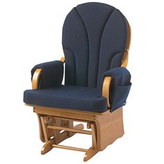 a wooden rocking chair with blue upholstered seat and back rests on a hard wood floor