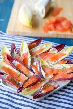 there is a plate of food that includes carrots and other vegetables on the table