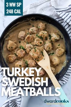 turkey swedish meatballs in a skillet with a wooden spoon