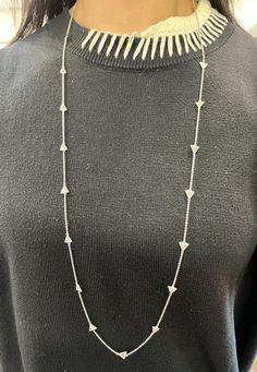 This gorgeous diamond by the yard necklace features 23 trillions that are G/H in color and VS in clarity. 32 inches in length and 18k, this necklace can be worn doubled or as a long necklace. Silver Station Necklace For Formal Occasions, Silver Station Necklace For Formal Events, Formal Fine Jewelry Silver Station Necklace, Silver Diamond Cut Station Necklace For Formal Occasions, Silver Station Necklace With Diamond Cut For Formal Events, Diamond By The Yard, Trillion Diamonds, Wedding Jewellery Necklace, G H