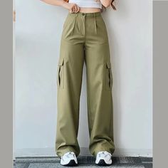 Fabricated with polyester, this garment features a secure zipper closure and a mid-rise waist. DETAILSMaterial: PolyesterClosure Type: Zipper FlyWaist Type: Mid Pants Silhouette, Celana Kargo, Cargo Pants Streetwear, Chique Outfit, Baggy Cargo Pants, Baggy Trousers, Plain Style, Mode Casual, Weave Style