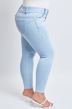 A favorite for a reason! Our Women’s Plus Mid-Rise WannaBettaButt 3-Button Skinny Jean features our signature heart shaped stitching and unique pocket shape that enhances your natural curves and gives your bum a lifted look. Featuring trendy detailing such as a 3-buttonfly and light distressing. Made in a mid-rise for a comfortable fit. Pair these with a light sweater and booties for an easy, chic look!Product Details- Mid-Rise- 3-Button Closure with Zipper- 5 Pocket Construction- Front DistressingSize & Fit (based on size 18)- Inseam: 29”- Rise: 11”- Leg Opening: 12”- Model is wearing a size 14Wash inside out.Machine wash cold.Tumble dry low.69% Cotton/ 26% Polyester/ 3% Other Fiber/ 2% Lycra Ymi Jeans, Jeans Store, Unique Pockets, Entrepreneur Fashion, Easy Chic, Fashion Bottoms, Natural Curves, Contemporary Outfits, Light Sweater