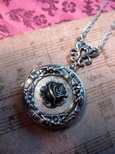 Silver Locket Necklace Photo Locket Pendant Flower Floral | Etsy Silver Round Pendant With Rose Design, Silver Necklace With Rose Design, Adjustable Vintage Rose Jewelry, Vintage Rose Jewelry For Wedding, Adjustable Vintage Pink Jewelry, Round Rose Jewelry For Anniversary, Vintage Rose Flower Jewelry, Anniversary Jewelry With Roses, Vintage Rose-colored Flower-shaped Jewelry