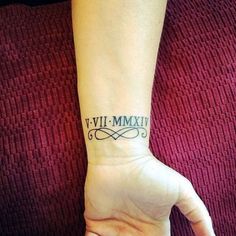 a woman's wrist tattoo with the word vi - vim on it