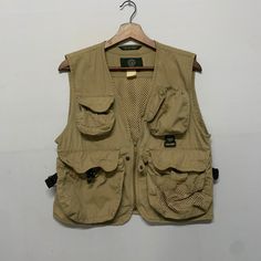 "PLEASE READ FULL DESCRIPTION BEFORE PURCHASING Vintage IVY-Brothers Multi Pocket Hunting Fishing Utility Tactical Sleeveless Vest Size On tag: M (Kindly please check measurement below) Material: Cotton Condition: 9/10 ( GREAT No hole No stain ) MEASUREMENT: All measurement are taken when laid flat on the ground in inches Chest (armpit to armpit): 18.5\" RECOMMENDED size S international Length (from top to bottom): 20\" PAYMENT & SHIPPING: Accept PAYPALL only and make sure you leave phone number Cheap Men's Khaki Vest, Cheap Khaki Men's Vest, Cheap Men's Workwear Vest, Hunting Style, Fishing Vest, Vintage Vest, Men's Outerwear, Sleeveless Vest, Hunting Fishing