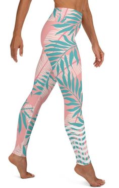 a woman in pink and blue patterned leggings with palm leaves on the side