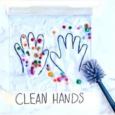 two handprints with the words clean hands written on them next to a brush