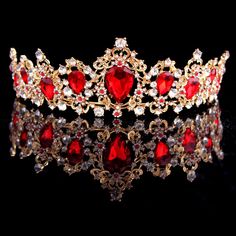 a tiara with red and white stones on it