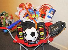 a soccer ball and sports equipment on a chair