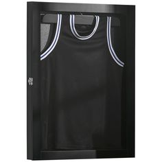 a black and white basketball jersey hanging in a wall mounted locker with two doors on each side