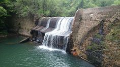 there is a large waterfall in the water