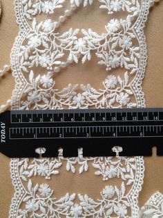 "Beautiful Embroidered Lace Trim Off White Wedding Lace Floral Lace Trim 5.03 inches wide 2 yards This listing is for 2 yards. Width: 5.03\" (12.8 cm) Use for clothing, neckline, shoulder belt, pillowcase, dresses, gifts, bags decoration, party dress, curtains, skirt bottoming, home decor and other projects you could imagine. Notice: Note: 1 yard = 91 cm; 1\" = 2.54 cm For more quantity, please feel free to convo me for custom listing. My shop link: http://www.etsy.com/shop/lindsay If you have a White Embroidered Border Fabric For Wedding, Embroidered Lace Wedding Dupatta, Wedding Lace Dupatta With Embroidered Border, Wedding Dupatta With Embroidered Lace Border, Off White Wedding, Pillowcase Dresses, Gifts Bags, Shoulder Belt, Wedding Lace