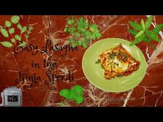 a green plate topped with food next to a toaster and potted leafy plant