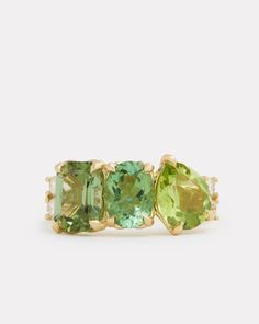 18K Yellow Gold Cluster Ring with Green Tourmaline, Peridot, and Diamonds, .2 TCWOrnament is 7/8 Inch x 3/8 Inch Style# YRCOCPGW Luxury Gia Certified Green Cluster Ring, Luxury Green Topaz Ring For Anniversary, Luxury Fine Jewelry Peridot Rings, Luxury Green Gemstones For Anniversary, Luxury Green Tsavorite Gemstones, Green Diamond Gemstones For May Birthstone, Green Diamond Fine Jewelry Gemstones, Luxury Green Multi-stone Emerald Ring, Emerald Cut Green Multi-stone Ring