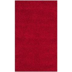 a red area rug on a white background with no one in the room to see it