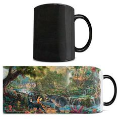 two black coffee mugs with disney's beauty and the beast artwork on them