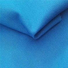 a close up shot of a bright blue fabric