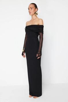 Black Slim Fit Maxi Dress 98% Polyester, 2% Elastane Fabric Type: Knitted Length: 160.0 cm Model Measurements: Height: 180cm (5'11') Chest 80cm (31in) Waist: 59cm (23in) Hip: 91cm (35in) Model is wearing size S Do not wash. Do not use bleach. Do not tumble dry. Do not iron. Dry cleanable. Elegant Off-shoulder Dress With Sheer Sleeves, Fitted Maxi Dress For Evening In Fall, Fall Formal Bodycon Maxi Dress, Fitted Midi Dress For Fall Gala, Sheer Sleeves Bodycon Maxi Dress For Evening, Evening Bodycon Maxi Dress With Sheer Sleeves, Evening Sheer Sleeves Sheath Midi Dress, Evening Midi Dress With Sheer Sleeves, Winter Formal Off-shoulder Dress