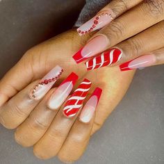 Go bold with long coffin red nails! Our blog post dives into a variety of designs, from the understated elegance of a simple look to the classic charm of a French tip. Perfect for those who love a dramatic look, especially during the festive Christmas season. Short Coffin Red Nails, Pretty Coffins, Long Coffin Nails