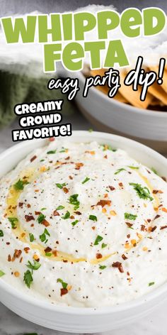 a white bowl filled with creamy crowd favorite whipped feta dip next to chips