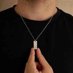 💎 This personalized bar necklace is the perfect blend of elegance and masculinity, designed to be a timeless piece for any man. Handcrafted from 925 sterling silver, this necklace is available in four striking finishes: silver, rose gold, black, and gold, offering a choice that complements any style. ♥️ With an adjustable length between 16 and 26 inches, this necklace can be customized to your preferred fit. Choose from 6 unique font styles to personalize the front with initials, names, or meaningful words. On the back, you can add a special touch by engraving coordinates, a message in your own handwriting, or a symbol like a heart or any other design that holds personal significance. 🖤 Whether you're commemorating a special place with engraved coordinates or gifting a loved one with a p Minimalist Rectangular Pendant Necklace For Father's Day, Father's Day Minimalist Rectangular Pendant Necklace, Minimalist Sterling Silver Necklace For Father's Day, Minimalist Rectangular Pendant Jewelry For Father's Day, Minimalist Dog Tag Necklace For Father's Day, Initial Tag Necklace, Unique Font, Ring Holder Necklace, Bar Necklace Personalized