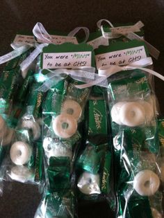 green and white buttons wrapped in plastic