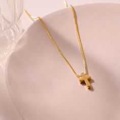 Elevate your style with this stunning Gold Cross Necklace 🌟 Perfect for baptism or as a thoughtful gift 🎁 Made of 14K Gold Plated brass with a delicate box chain. #CrossNecklace #BaptismGift #DaintyPendants #GoldJewelry #GiftIdeas ✨ Gold Cross Necklace For Women Simple, Brass Jewelry Design, Gold Cross Necklace, Dainty Pendant, Jewelry Design Necklace, Necklace Dainty, Gold Cross, Understated Elegance, Brass Jewelry