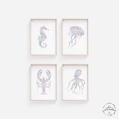 three framed pictures on the wall with seahorses in watercolor and pastel paint